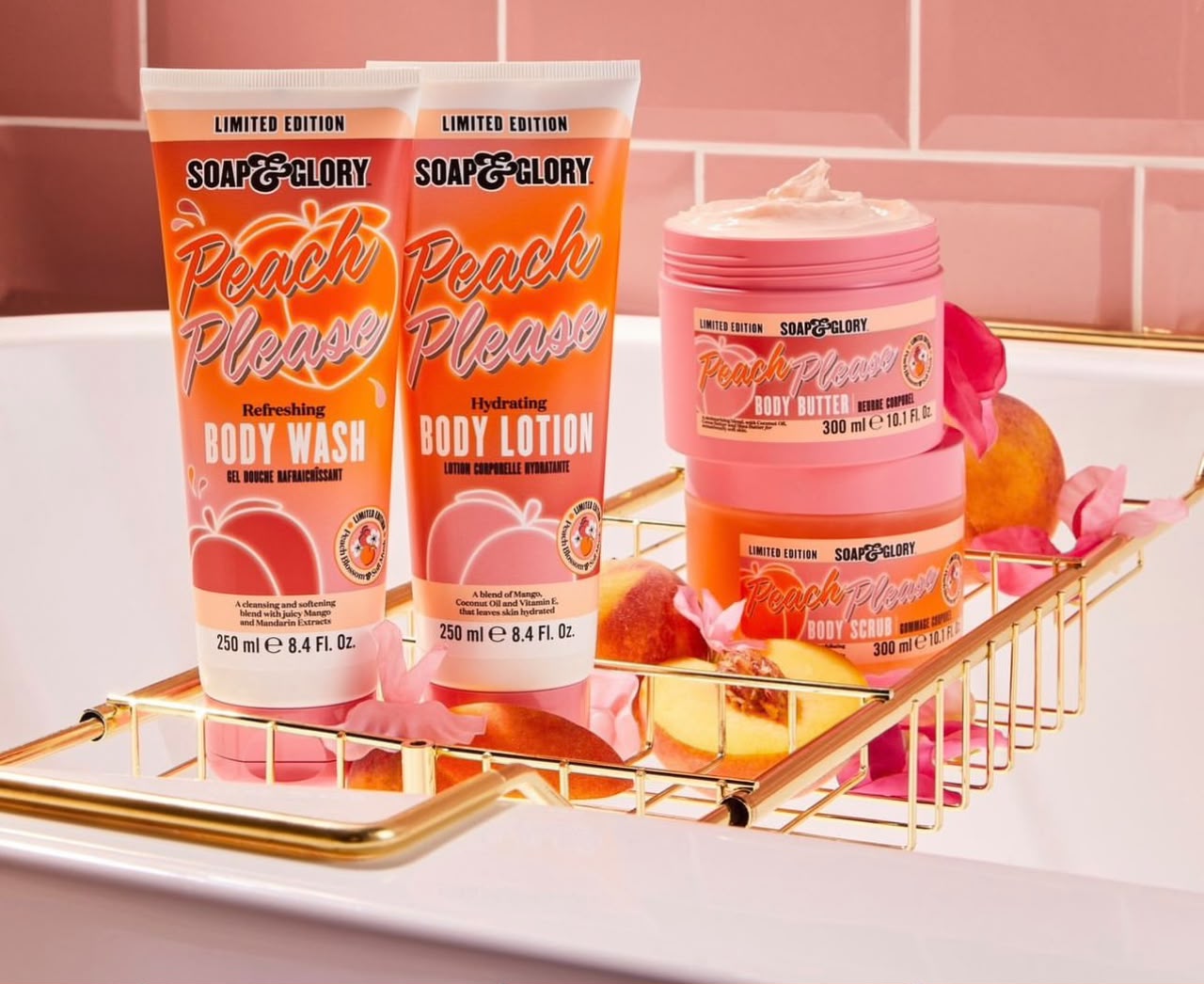 Soap & Glory Peach Please body wash, lotion, butter and scrub on a gold bath tray — cosmetics available in Dar es Salaam