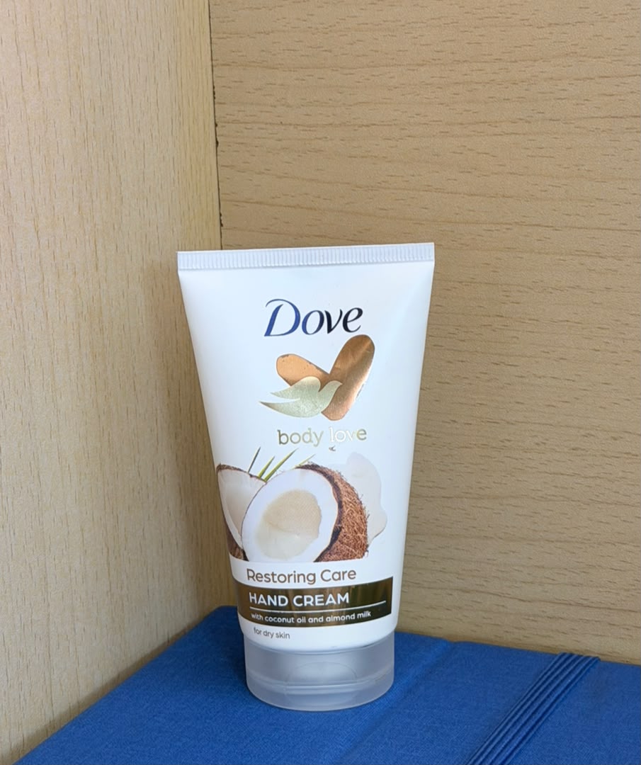 Dove Body Love Restoring Care hand cream tube with coconut